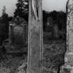 Inveraray, Kilmalieu Burial Ground.
View of face of Medieval cross shaft,with the lower part of a crucifix.