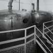 Bowmore Distillery
Interior view within mash house showing copper hot water tanks