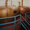 Bowmore Distillery
Interior view within mash house showing copper hot water tanks