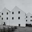 Lagavulin Distillery
View from W of W side of bonded warehouses, with barrels in yard (foreground)