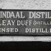 Lochindaal Distillery, Port Charlotte.
Detail of name board of former licensees