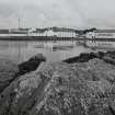 Laphroaig Distillery
General view of distillery from SSE,with rocky foreshore and bay in foreground