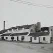 Jura Distillery
General view from NE of main block of distillery, containing Still House, with offices in foreground