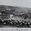 Kilmory, Chapel.
View of the village showing the position of the ancient chapel. Copy of historic photograph, inscribed 'Village and ruins of chapel at Kilmory, Point of Knap'.