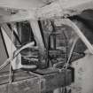 Machrimore Mill, interior.
View of cleaning (screening) sieve above East pair of (groating) stones.