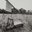 Tenter-frames and wheelbarrow for transporting wet cloth from mill