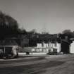 Mull, Tobermory, Eas Brae, Ledaig Distillery.
General view of former Manager's House and range of former maltings with steel draff hopper from East.
