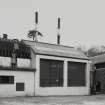 Mull, Tobermory, Eas Brae, Ledaig Distillery.
General view across yard to Boiler House and Tun Room no. 2 from South-East.
