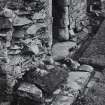 Oronsay Priory.
Detail of base of buttress and plinth at West end of South wall.