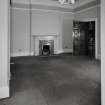 Oban, Dalriach Road, Maternity Hospital, interior.
View of ground floor South-West room. White marble fireplace and fancy cornice.