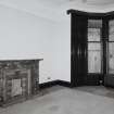 Oban, Dalriach Road, Maternity Hospital, interior.
View of ground floor room. Veined marble fireplace and large bay window (boarded-up).