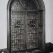 Oban, Dalriach Road, Maternity Hospital, interior.
View of arched stained glass window, with two coats of arms.