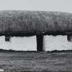 Tiree, Saundaig, thatched cottages.
General view of Northern cottage from East.