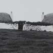 Tiree, Saundaig, thatched cottages.
General view of Northern and Southern cottage from East.