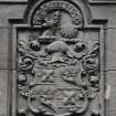 Detail of armorial panel over main entrance.