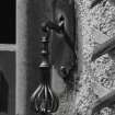 Main entrance.
Detail of bell pull.