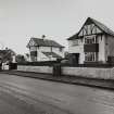 General view of specimen houses nos 8 and 10 from NW.