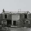 Lanark, North Vennel, Old Tannery: view from N, of derelict two-storey, rubble-built building with external stair to first floor.