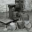 Interior.
View of weighing machine, weights and utensils.