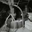 Interior.
View of mill stone and lifting gear.