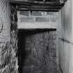 West wall - basement: furnace access passage