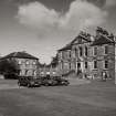 View of main house and stable wing from South.