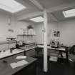 Interior.
View of mail room in North-East range of main office block.