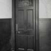 Interior. 1st floor flat, detail of specimen door