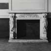 Interior.
Detail of corridor fireplace with flanking caryatids.