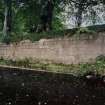 Detail of retaining wall on river bank adjacent to mill lade