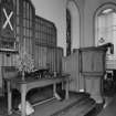 Interior. View of platform showing communion table and pulpit