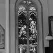 Interior. Detail of N Aisle Woodburn Memorial stained glass window " He loved them to the End"