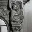 Library, detail carved figure on fireplace