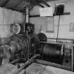Interior. View within winding-engine house showing electric winder, cable and drum.