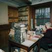 Interior. Hone Works office, general view, with the secretary, Mrs McLellan, at her desk