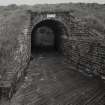 View from NE of brick-lined through baffle wall to DF6 (disused)