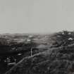 Photographic copy of general view showing original Nitro-glycerine Hill at Ardeer, also showing ironworks in distance (right), and landscape of dunes and huts.