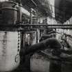 Photographic copy of Interior view of Acids Department showing Glycerine Refinery Distillation Plant