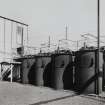 Photographic copy  View of  Propulsive Department. Alcohol Still and Storage Tanks