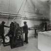 Photographic copy of glass negative of Interior.  Nitro cellulose powder press house showing cutting machine (1) (2621w)