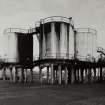 View of bitumen storage tanks from SSW.