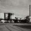 View of bitumen storage tanks from SW.