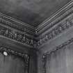 Interior.
Detail of cornice, frieze and panelling in SE apartment on first floor.