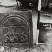 View of flattop headstone.
Insc: "REWKB"
Largs Parish Churchyard no 24-B
