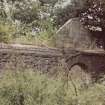 View of wall with arched opening.
