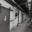 Glasgow Museum of Transport, interior.
View along wakway in stable block from West.