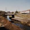 General view of Lambhill Bridge and Forth and Clyde Canal with towpath from E showing Skirsa Street housing