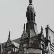Glasgow, 2-6 Cadogan Street.
Detail of South-West corner spire with statuette and 1888 chimney.