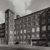 Glasgow, 121 Carstairs Street, Cotton Spinning Mills.
Exterior view from SW of W side of mill including stair tower
