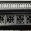 Detail of portion of cast-iron cladding on side of bridge beneath parapet (at deck level)